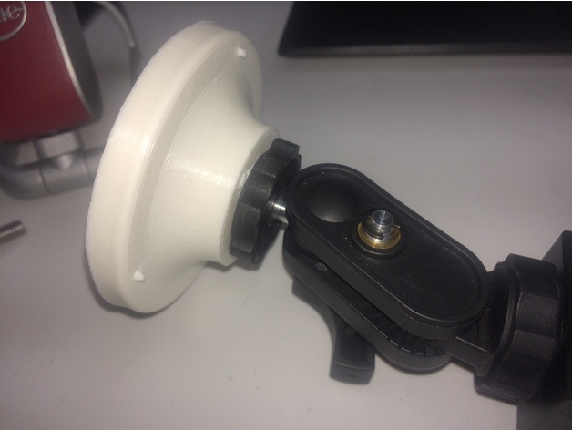 3d printed camera mount attached to tripod adapter