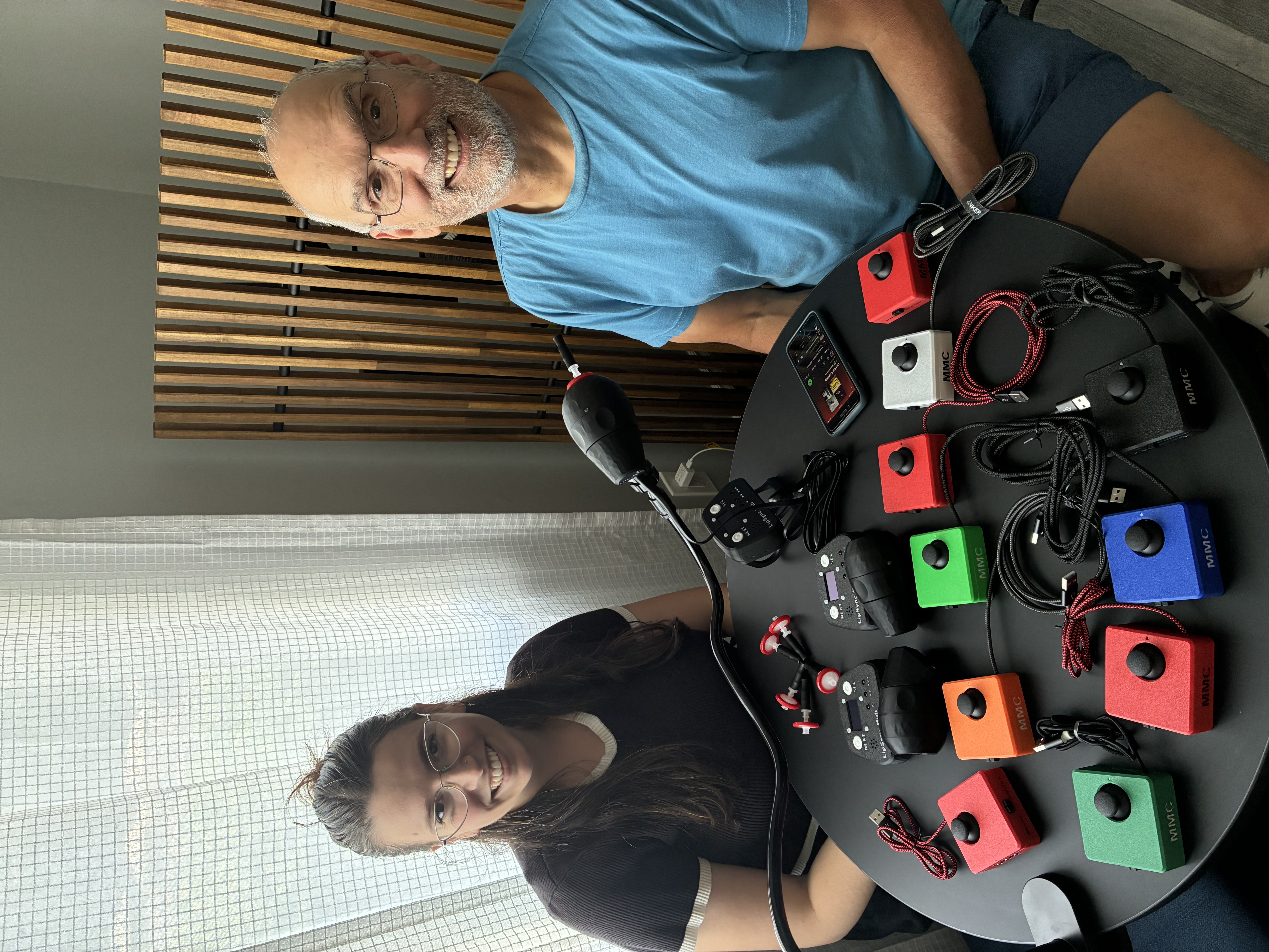 Alyssa and Jody showing off the devices they've built, including many Cedar joysticks and a LipSync.