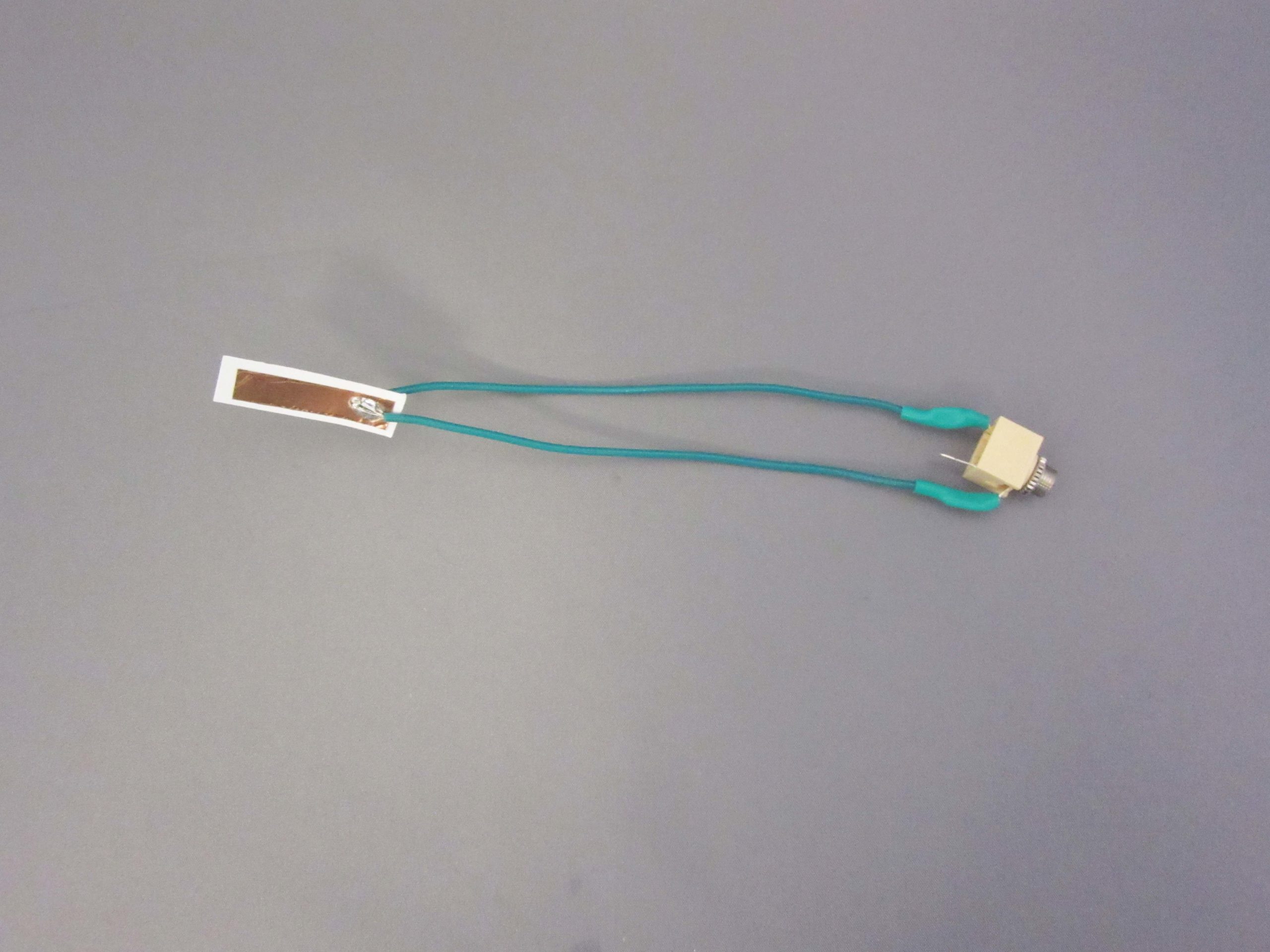 A photo of a soldered battery interrupter